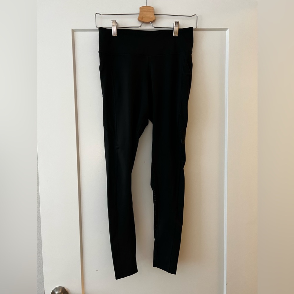 Nike Dri-fit black leggings in size M